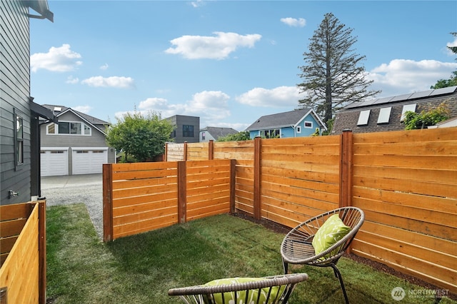 8227 Latona Ave NE, Seattle, WA 98115 - view of yard with a residential view and a detached garage