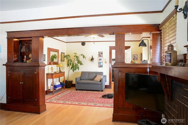 202 E 3rd Ave, Ritzville, WA 99169 - living area featuring ornamental molding, wood finished floors, and a ceiling fan