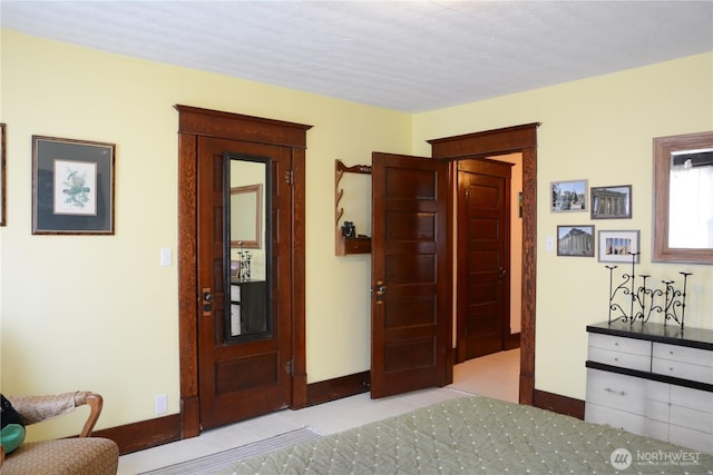 202 E 3rd Ave, Ritzville, WA 99169 - bedroom featuring baseboards and light tile patterned floors