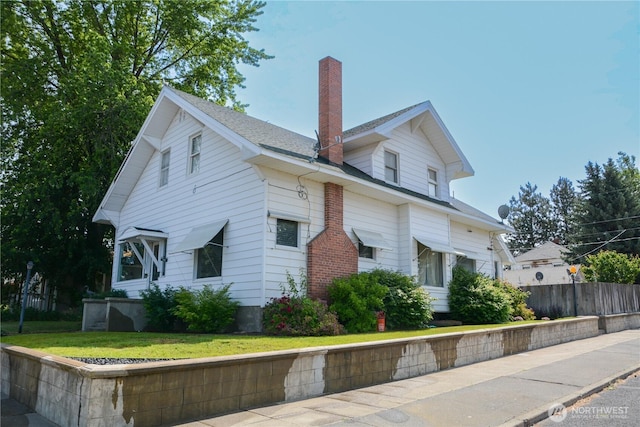 202 E 3rd Ave, Ritzville, WA 99169 - view of side of property featuring a chimney
