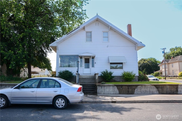202 E 3rd Ave, Ritzville, WA 99169 - bungalow-style house with a chimney