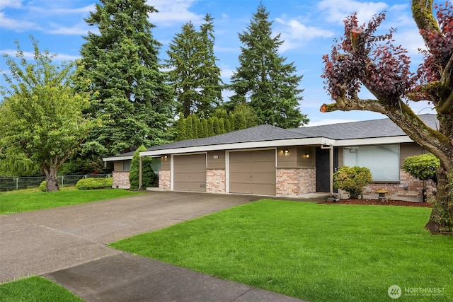 501 21st St SE, Auburn, WA 98002 - view of front facade featuring brick siding, asphalt driveway, a garage, and a shingled roof
