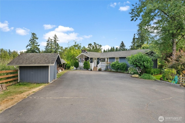 11810 County Line Rd E, Edgewood, WA 98372 - ranch-style house with a storage shed and driveway