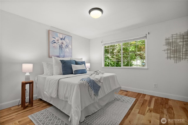 11810 County Line Rd E, Edgewood, WA 98372 - bedroom featuring light wood finished floors