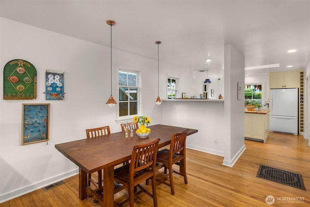 4512 35th Ave W, Seattle, WA 98199 - dining space with light wood-type flooring and recessed lighting