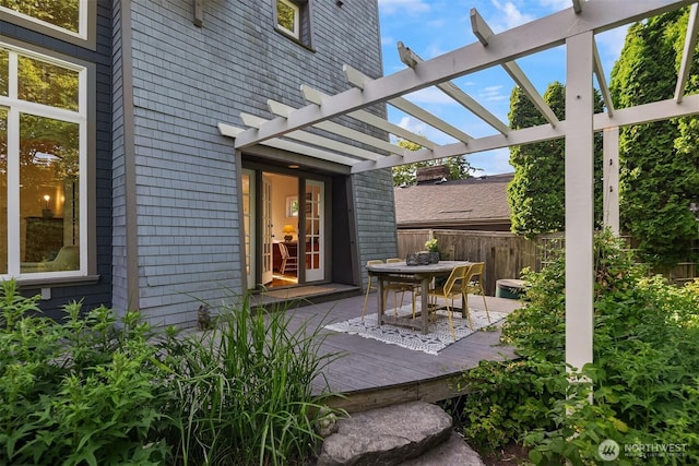 4512 35th Ave W, Seattle, WA 98199 - view of patio featuring a wooden deck, a pergola, and outdoor dining area