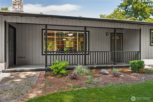262 Falls Rd, Randle, WA 98377 - entrance to property featuring covered porch and a chimney