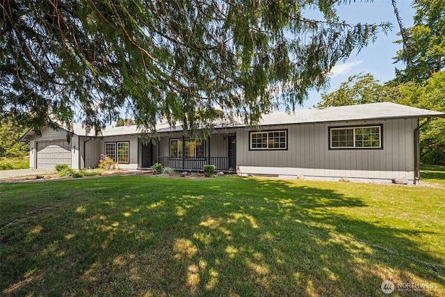 262 Falls Rd, Randle, WA 98377 - ranch-style house with an attached garage, a front lawn, and a porch