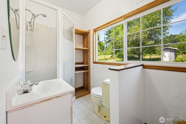 262 Falls Rd, Randle, WA 98377 - full bath with tile patterned floors, vanity, a shower, and a textured wall
