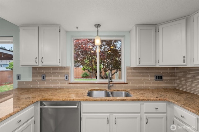 5411 Komachin Loop SE, Lacey, WA 98513 - kitchen with dishwasher, white cabinets, backsplash, light stone counters, and a textured ceiling