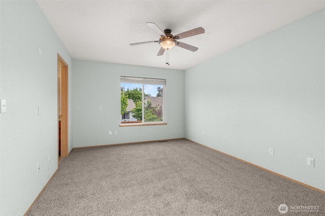 5411 Komachin Loop SE, Lacey, WA 98513 - carpeted empty room featuring a ceiling fan and baseboards