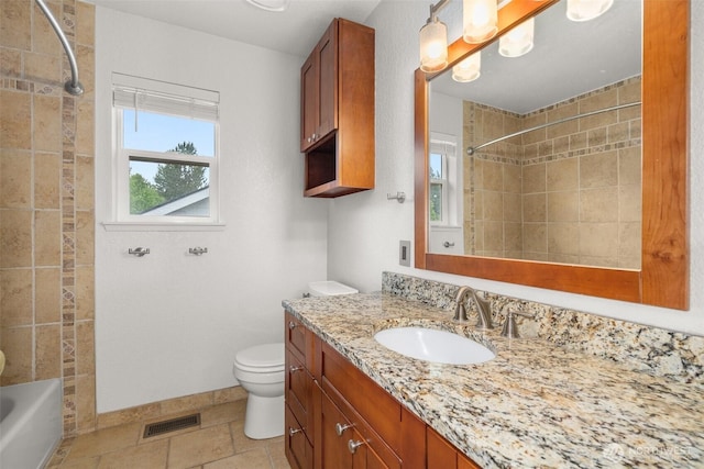 5411 Komachin Loop SE, Lacey, WA 98513 - bathroom featuring vanity, bathtub / shower combination, and tile patterned floors