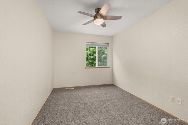 5411 Komachin Loop SE, Lacey, WA 98513 - unfurnished room featuring a ceiling fan and carpet floors