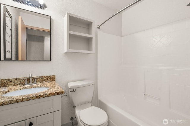 5411 Komachin Loop SE, Lacey, WA 98513 - full bathroom with vanity, tub / shower combination, and a textured wall