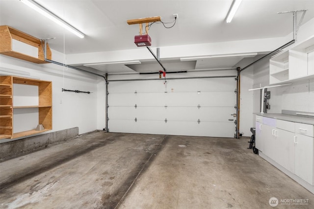 5411 Komachin Loop SE, Lacey, WA 98513 - garage with a garage door opener