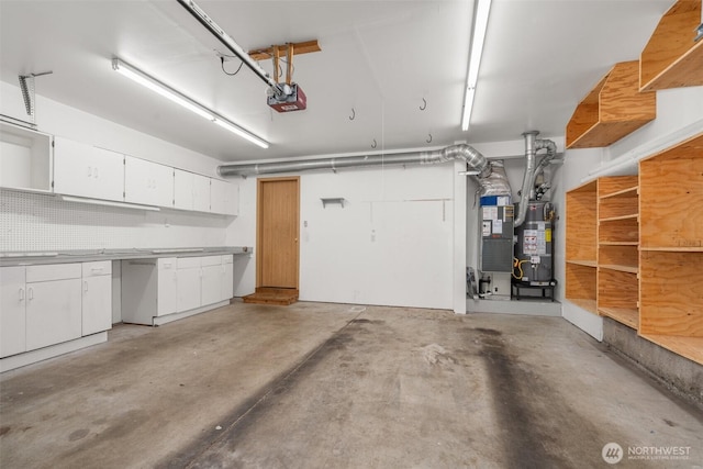 5411 Komachin Loop SE, Lacey, WA 98513 - garage featuring a garage door opener, strapped water heater, and heating unit