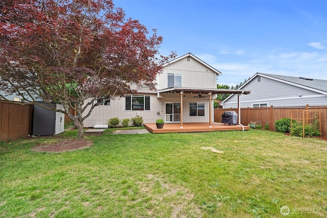 5411 Komachin Loop SE, Lacey, WA 98513 - back of house featuring a ceiling fan, a fenced backyard, and a wooden deck