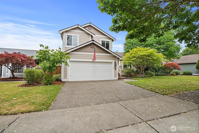 5411 Komachin Loop SE, Lacey, WA 98513 - traditional-style home with a front lawn, an attached garage, and concrete driveway