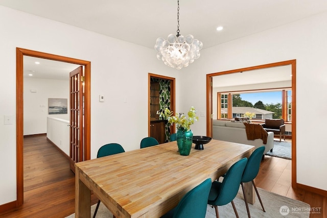 12238 9th Ave NW, Seattle, WA 98177 - dining area featuring hardwood / wood-style flooring, a chandelier, and recessed lighting