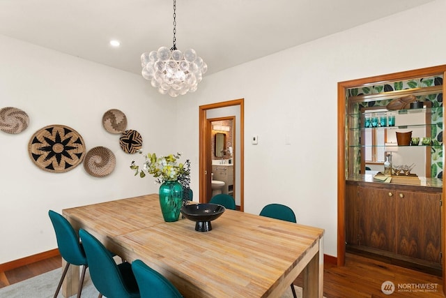 12238 9th Ave NW, Seattle, WA 98177 - dining room with wood finished floors, a chandelier, and recessed lighting
