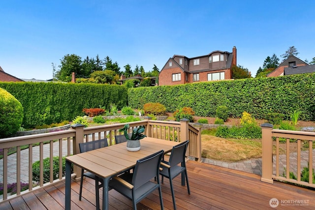 12238 9th Ave NW, Seattle, WA 98177 - deck with outdoor dining area and a fenced backyard