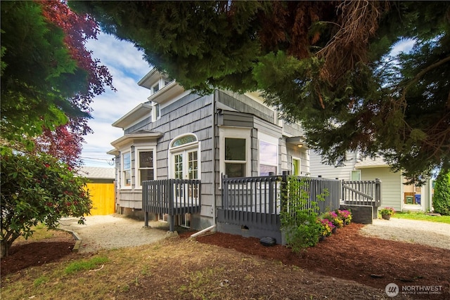 1103 E 59th St, Tacoma, WA 98404 - view of front of property with a deck