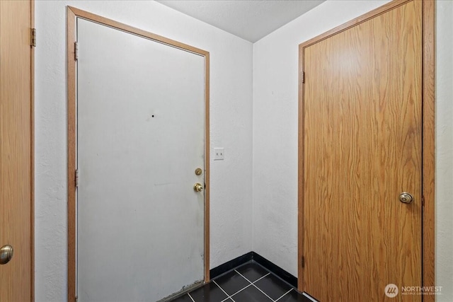 7634 Shilohwood Pl NW, Bremerton, WA 98311 - doorway with dark tile patterned floors