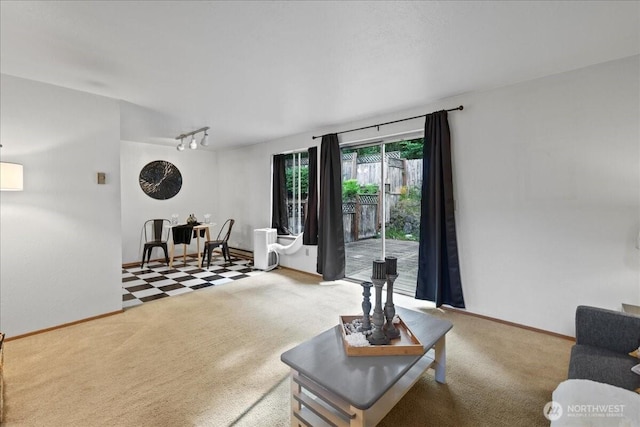 7634 Shilohwood Pl NW, Bremerton, WA 98311 - carpeted living room featuring baseboards and track lighting