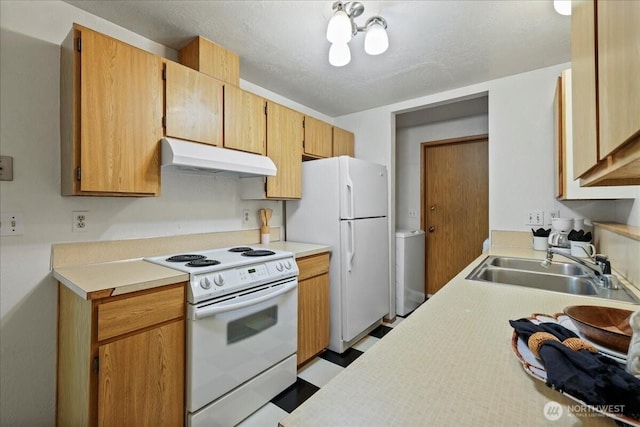 7634 Shilohwood Pl NW, Bremerton, WA 98311 - kitchen with white appliances, under cabinet range hood, and light countertops