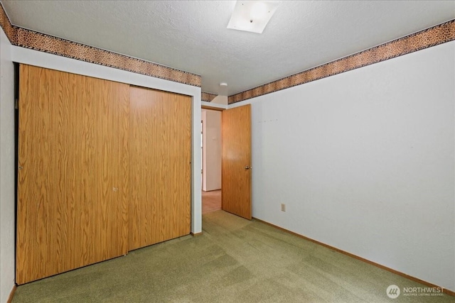7634 Shilohwood Pl NW, Bremerton, WA 98311 - unfurnished bedroom featuring carpet flooring and a closet