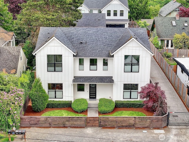 10702 39th Ave NE, Seattle, WA 98125 - modern inspired farmhouse featuring board and batten siding and roof with shingles