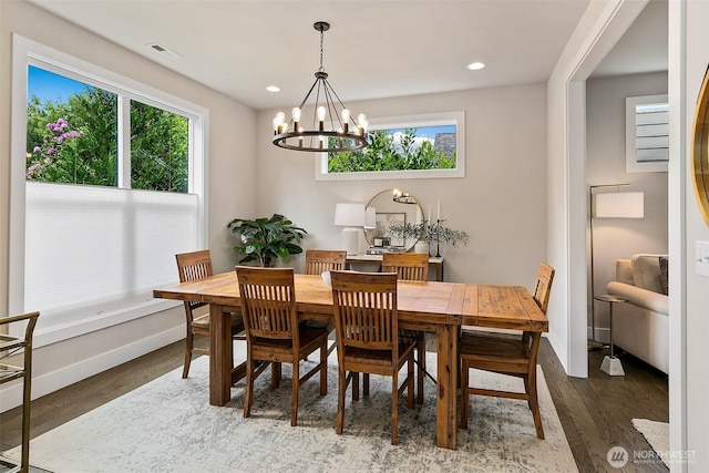 10702 39th Ave NE, Seattle, WA 98125 - dining space featuring a chandelier, wood finished floors, and recessed lighting