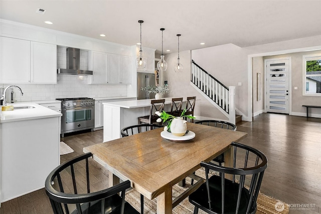 10702 39th Ave NE, Seattle, WA 98125 - dining area with stairway, dark wood-style floors, and recessed lighting