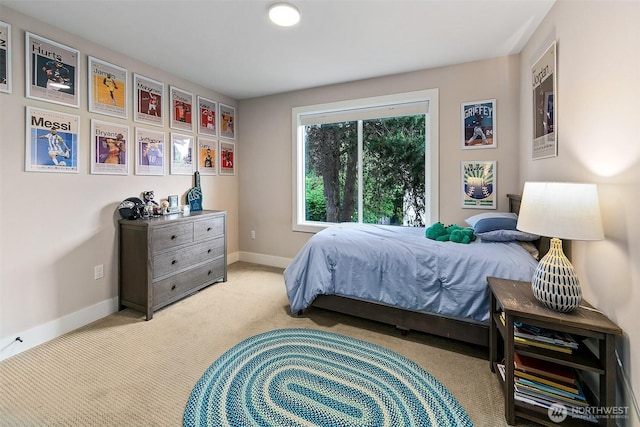 10702 39th Ave NE, Seattle, WA 98125 - bedroom with baseboards and light carpet