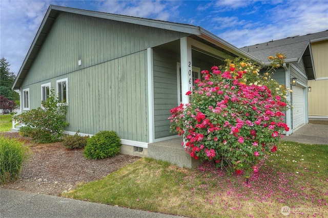 20614 6th Avenue Ct E, Spanaway, WA 98387 - view of side of home featuring a garage