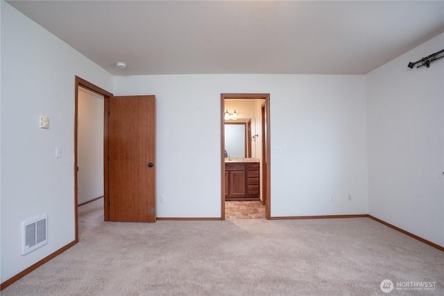 20614 6th Avenue Ct E, Spanaway, WA 98387 - unfurnished bedroom featuring light colored carpet and ensuite bathroom