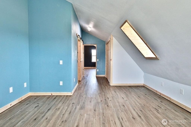 132 Milky Way, Sequim, WA 98382 - bonus room featuring vaulted ceiling, a skylight, and wood finished floors