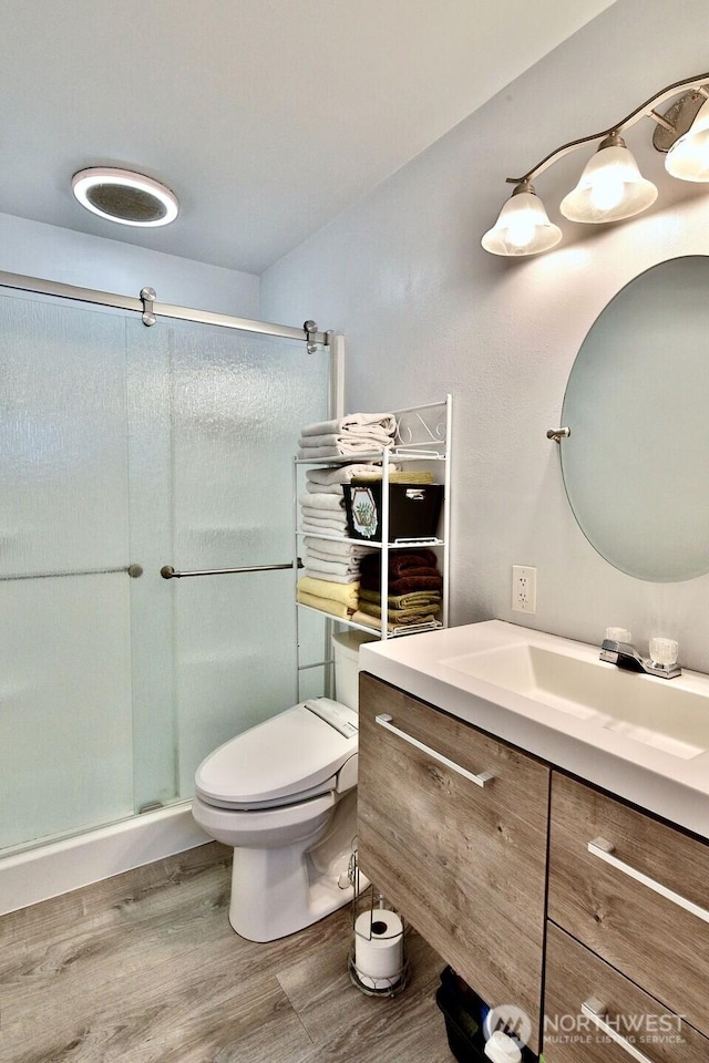 132 Milky Way, Sequim, WA 98382 - full bath with vanity, wood finished floors, and a stall shower