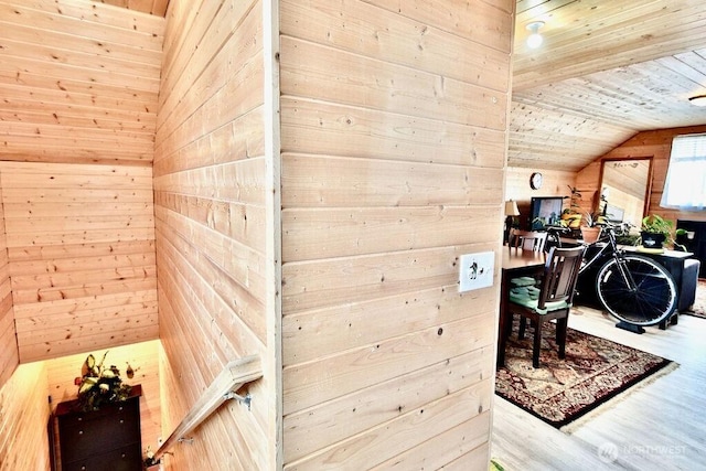 132 Milky Way, Sequim, WA 98382 - laundry area featuring wood walls, wood finished floors, and wooden ceiling