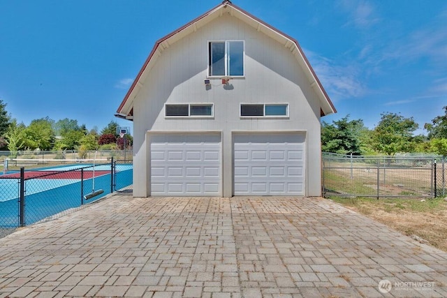 132 Milky Way, Sequim, WA 98382 - garage with decorative driveway and a garage