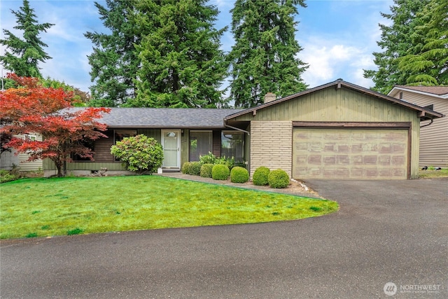 3824 S 176th St, Seatac, WA 98188 - ranch-style house featuring a garage, a front lawn, asphalt driveway, brick siding, and a chimney