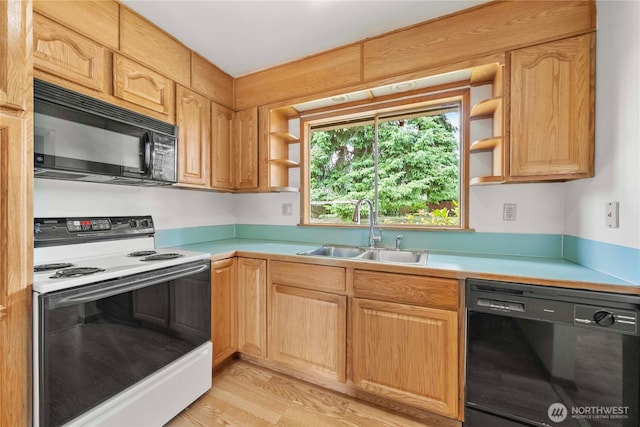 3824 S 176th St, Seatac, WA 98188 - kitchen featuring black appliances, open shelves, light countertops, and light wood finished floors