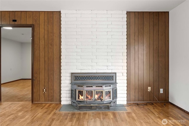 3824 S 176th St, Seatac, WA 98188 - detailed view of wood finished floors, wood walls, and a wood stove