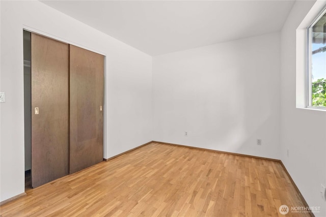 3824 S 176th St, Seatac, WA 98188 - unfurnished bedroom with light wood finished floors and a closet