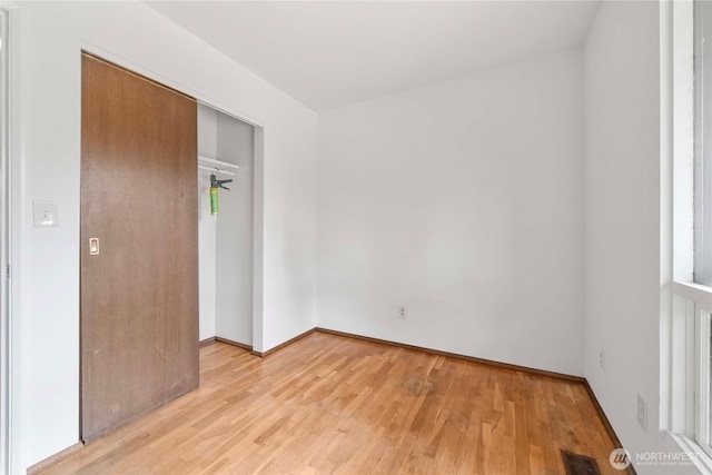 3824 S 176th St, Seatac, WA 98188 - unfurnished bedroom with light wood finished floors and a closet