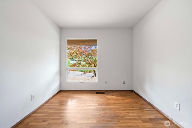 3824 S 176th St, Seatac, WA 98188 - unfurnished room featuring light wood-style flooring and baseboards