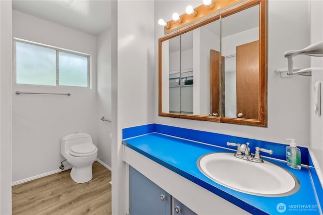 3824 S 176th St, Seatac, WA 98188 - bathroom featuring wood finished floors and vanity