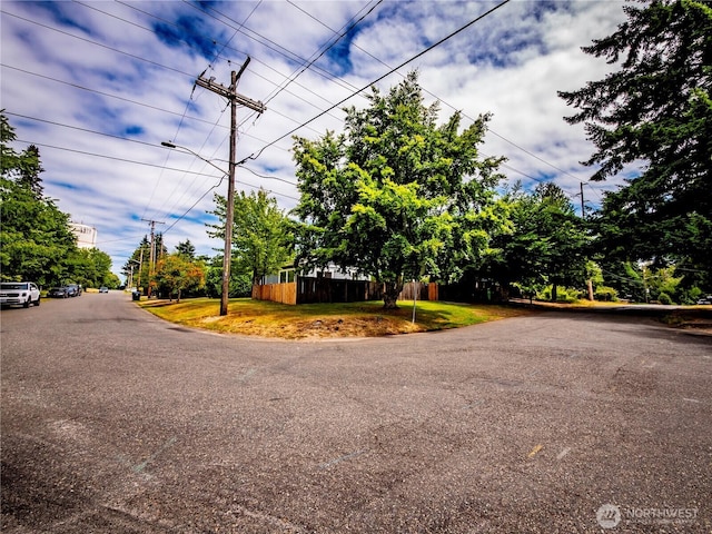 1804 SE 10th Ave, Olympia, WA 98501 - view of asphalt street with street lights and view of wooded area