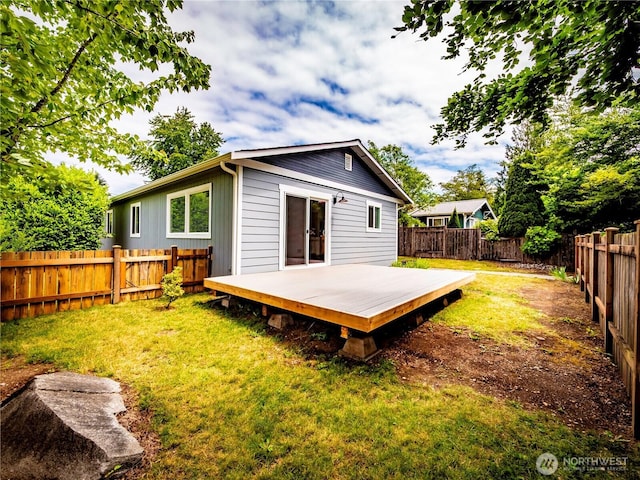 1804 SE 10th Ave, Olympia, WA 98501 - rear view of house with a fenced backyard and a wooden deck