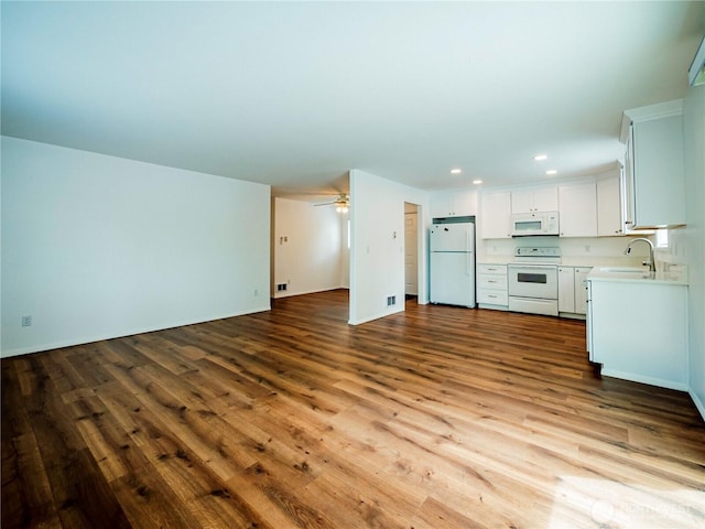 1804 SE 10th Ave, Olympia, WA 98501 - unfurnished living room featuring recessed lighting, dark wood-style floors, and a ceiling fan